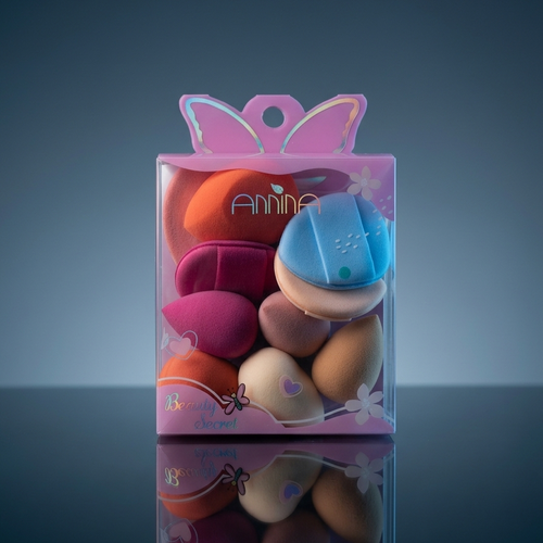 Packaged butterfly-shaped items with colorful design on a reflective surface